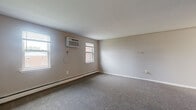 Located at 2804 Colony Dr in Audubon, PA, this single-floor residence offers four bedrooms and one bathroom within a practical and well-organized layout. The home is finished throughout with neutral-toned carpet and light gray walls, creating a clean and cohesive aesthetic across all rooms.

The generously sized primary bedroom is a standout feature, offering ample space for furnishings and includes access to a closet. Each of the additional bedrooms is comfortably proportioned, with individual windows that bring in natural light and views of the surrounding neighborhood. Several rooms are equipped with wall-mounted air conditioning units, and baseboard heating runs throughout the home, ensuring year-round climate control.

The bathroom features a full tub and shower combination surrounded by clean white subway tile, providing a simple and functional design. A dedicated closet offers additional storage for the household.

The overall layout, as seen in the dollhouse view, follows a straightforward linear floor plan, making the space easy to navigate. The neutral finishes and consistent carpeting throughout lend the home a move-in ready feel. The property's location in Audubon, PA places it within a residential community, offering a quiet and accessible setting for everyday living.
