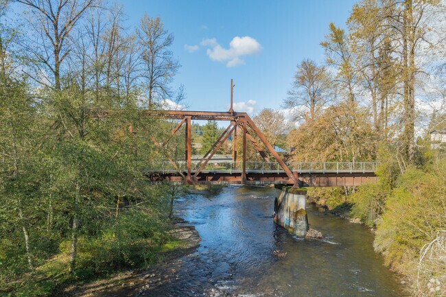 Scenic Cedar River bridge is a favorite spot for locals to enjoy the sun.