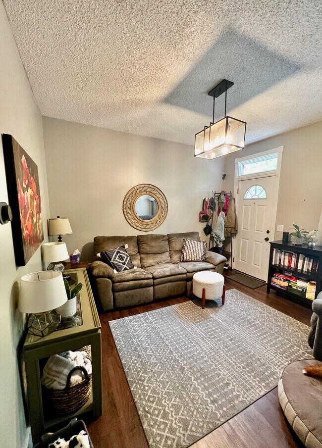 Relax in your new living room. - 456 Forest St