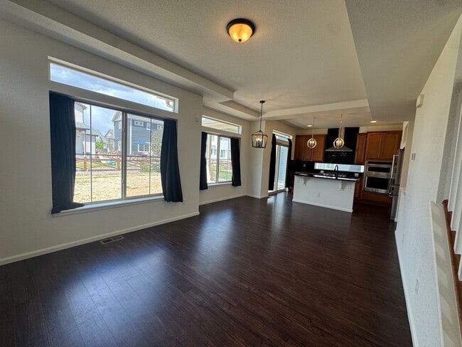 Building Photo - Luxury Corner Lot Home in Banning Lewis with Finished Basement, Wet Bar & Designer Upgrades