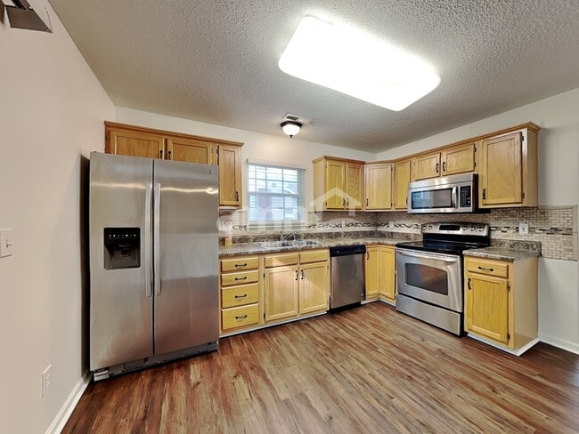 Building Photo - 316 Windsong Dr