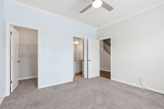 Building Photo - Stylish 4-Bedroom Townhome with Backyard O...