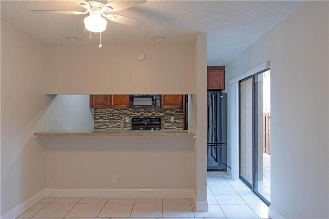 Building Photo - 3799 Cocoplum Cir