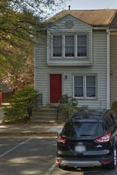 Front with two reserved parking spot in front of the unit. - 6153 Glen Eagles Ct