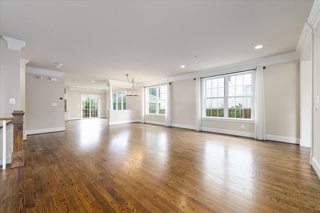 spacious open living/dining room - 8104 Old Georgetown Rd