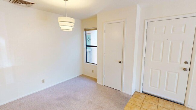 Building Photo - Light-Filled Upstairs Condo in a Prime Location