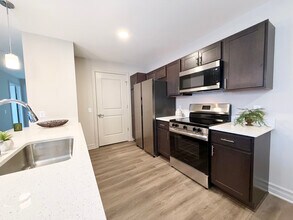 2BR, 2BA - 1056SF - Kitchen - Theo's Place - NEW BUILD - RENT SPECIALS