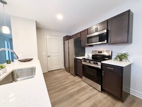 2BR, 2BA - 1056SF - Kitchen - Theo's Place - NEW BUILD - RENT SPECIALS