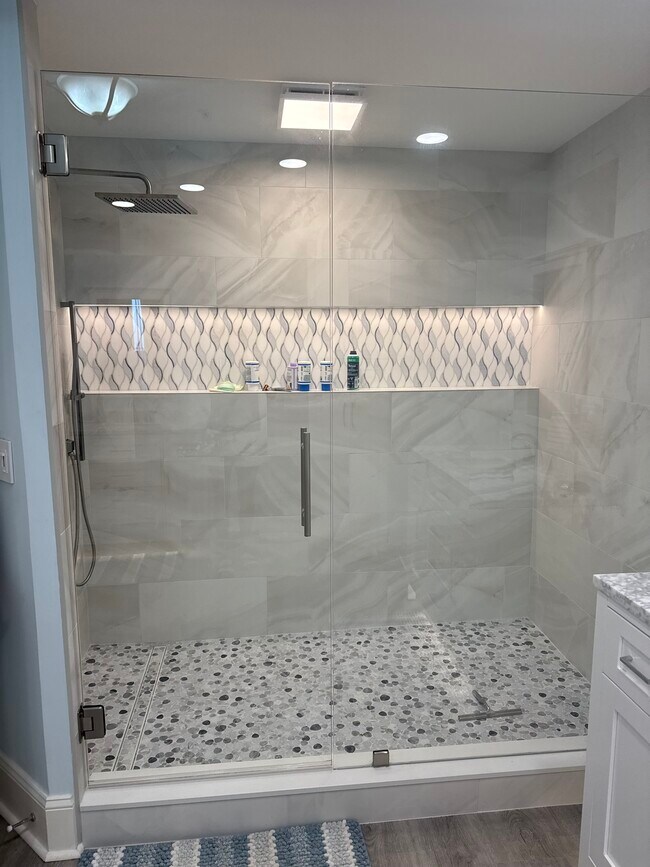 Newly remodeled Master shower with all new tile and combo rain shower - 1031 1st St S