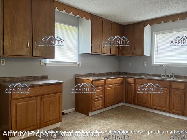 Building Photo - 3 br, 1 bath House - 1523 Macgillicuddy Dr