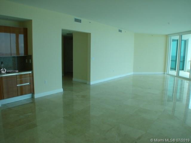 Building Photo - 16047 Collins Ave