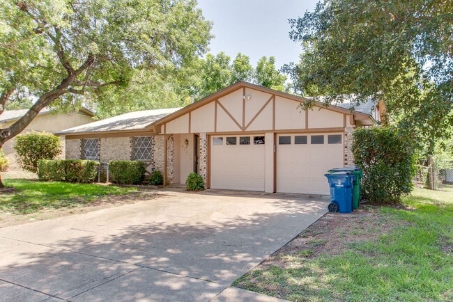 Building Photo - No Carpet! Great tree shaded yard!