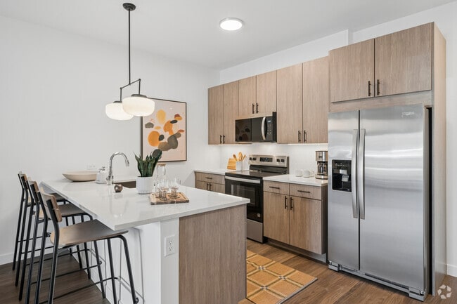 Patio 1BR, 1BA - 746SF - Kitchen - Galewood Residences