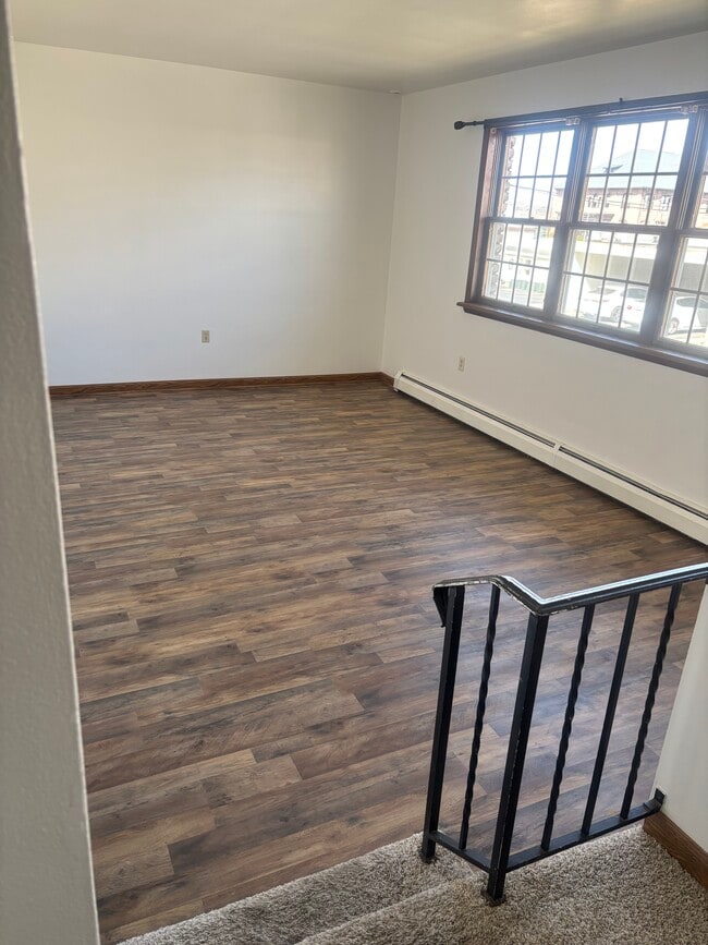 Large living room with big windows - 24 E Walton St