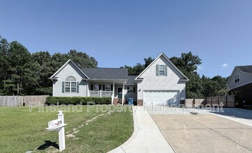 Building Photo - 219 Woodland Dr