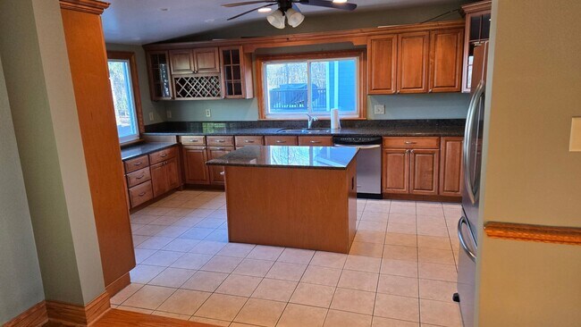 Building Photo - **RIVERFRONT 4-BEDROOM/3-BATH WITH 4-CAR GARAGE, FULL BASEMENT!!**