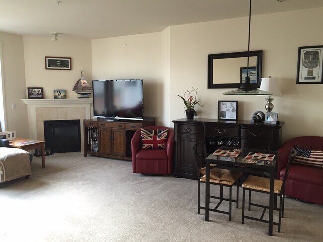Living room with gas fireplace. - 109 2nd St S