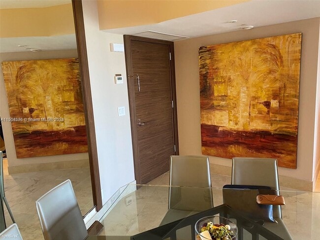 Building Photo - 2 br, 2 bath Condo - 1000 W Island Blvd Ap...