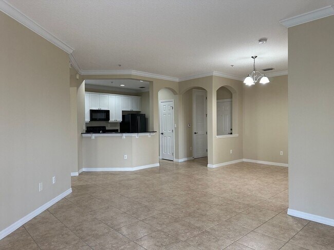 Building Photo - Lakeside at Lakes of Windermere, 3rd Floor...