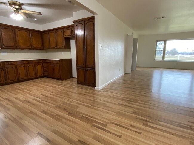 Kitchen opens to large dining/living area - 5819 Michael Rd