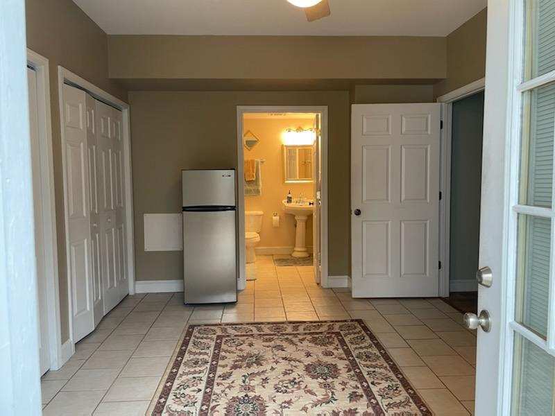 Common area that flows into a full bath - 80 Cedar Rdg
