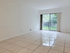 Building Photo - 8550 N Sherman Cir