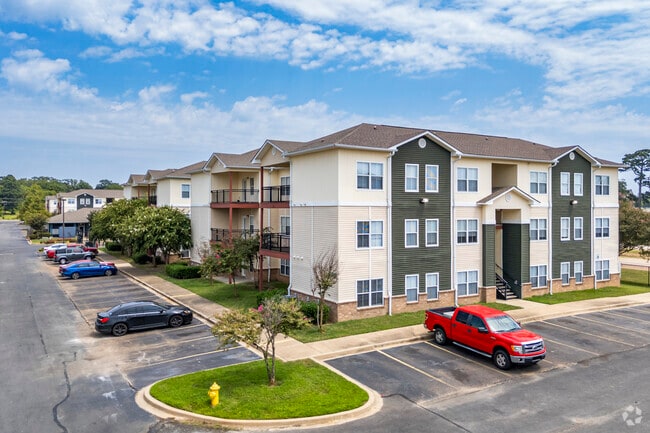 Professionally Maintained Landscaping Surrounds the Property - The Quad