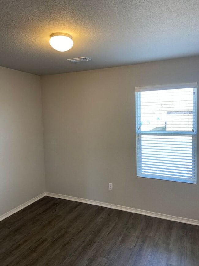 Building Photo - Pre-Leasing Now! | Modern Four-Bedroom, Two-Bath Home in Conrad Court