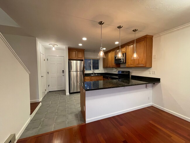 Kitchen (and entrance door to the left). Eat-in counter. - 10 Professional Center Pky