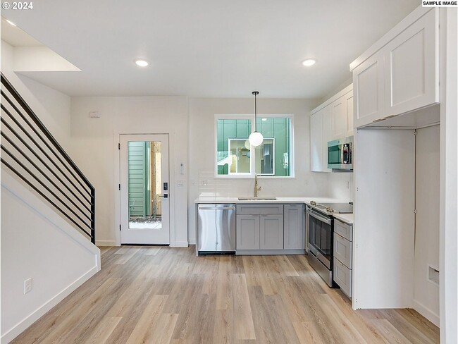 Building Photo - Inviting Home with Open Living & Stainless Steel Kitchen