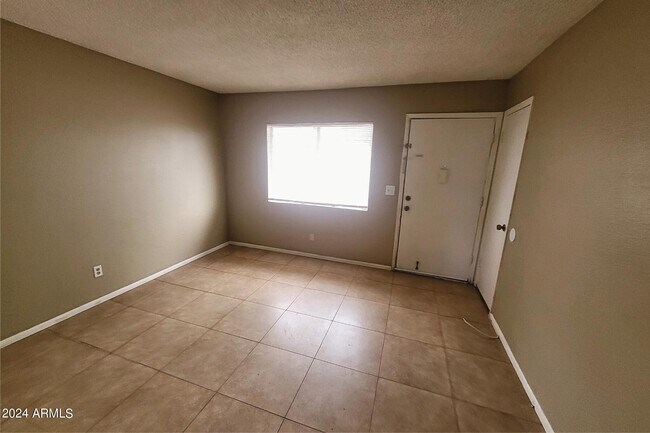 Building Photo - 6440 E Alder Ave