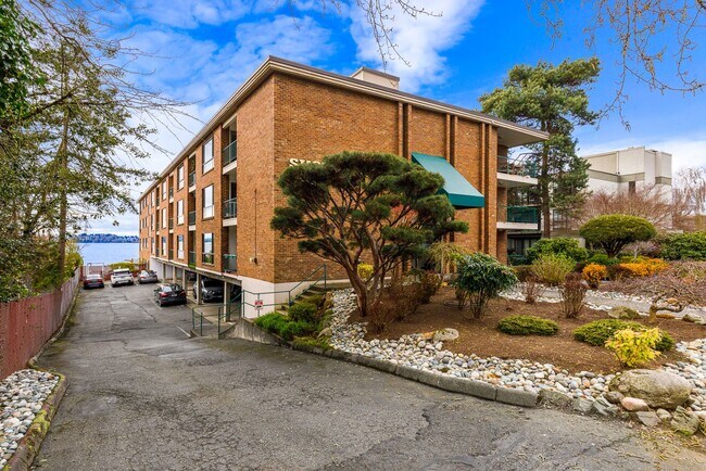 Building Photo - Waterfront Serenity: 1 Bedroom 1 Bathroom Luxury Living with Dock Access