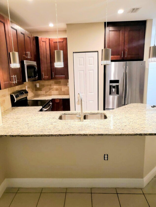 Primary Photo - 5032 SE Mariner Garden Cir