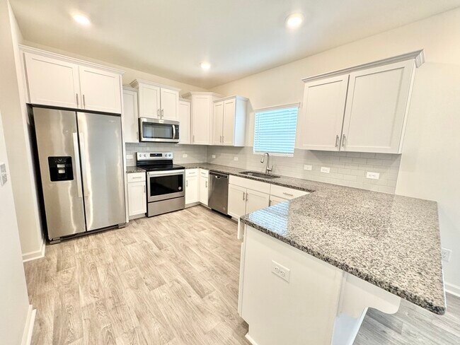 Foto del edificio - 3 br 2.5 ba townhome with 1 car garage Rea...