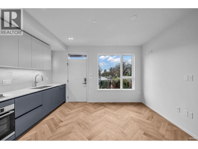 Building Photo - 775 W 49th Ave