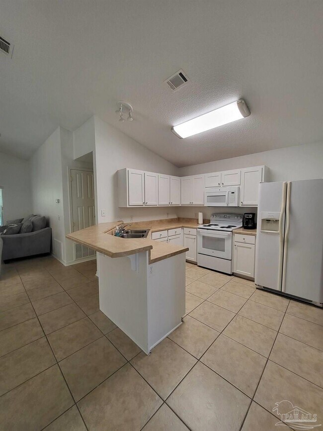 Foto del edificio - 1261 Harrison Ave