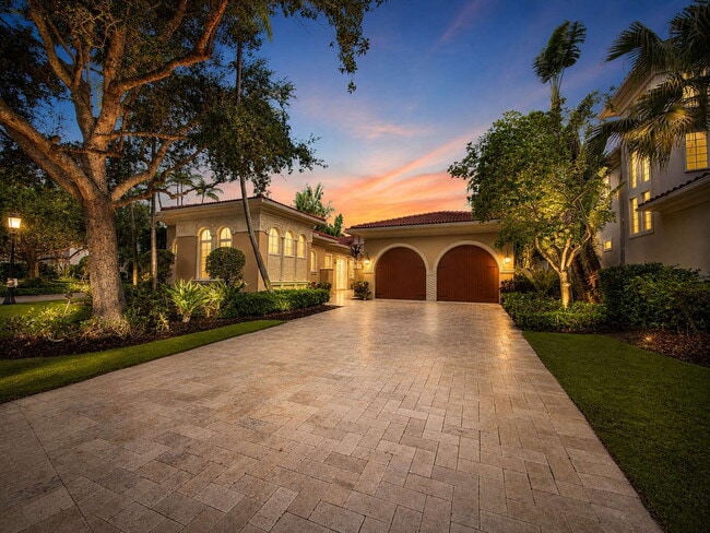 Photo - "Luxurious 4-Bed Oasis with Scenic Views & Pool at 11209 Orange Hibiscus Lane!" Apartment