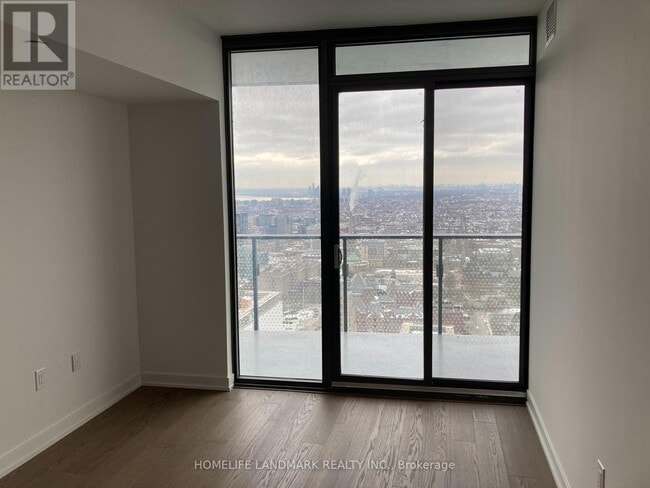 Building Photo - 11 Wellesley St W