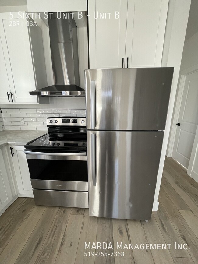 Photo du bâtiment - MODERN 2 BED/1 BATH UNIT IN CHATHAM + HYDRO