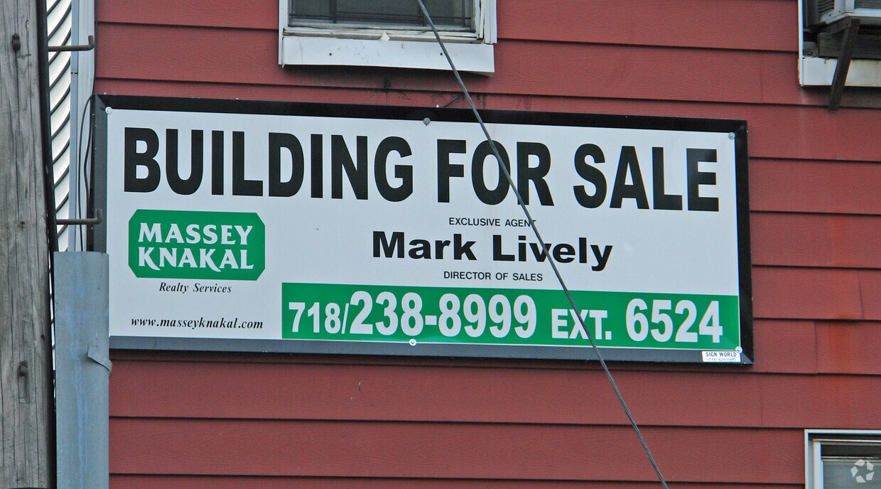 sign - 154 Huron St