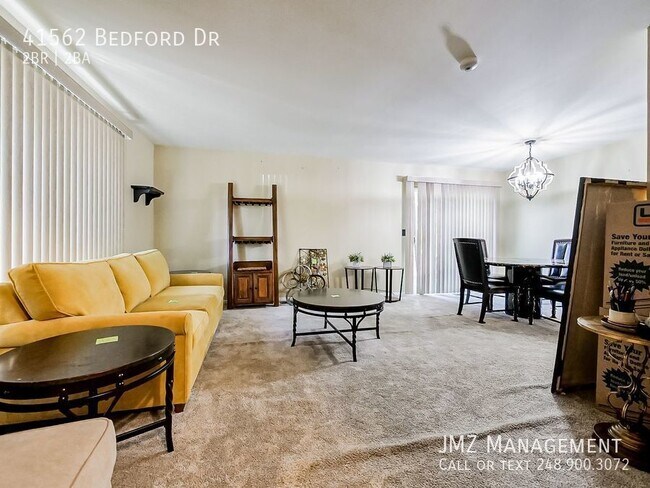 Building Photo - Welcome to this charming 2-bedroom, 1.5-ba...