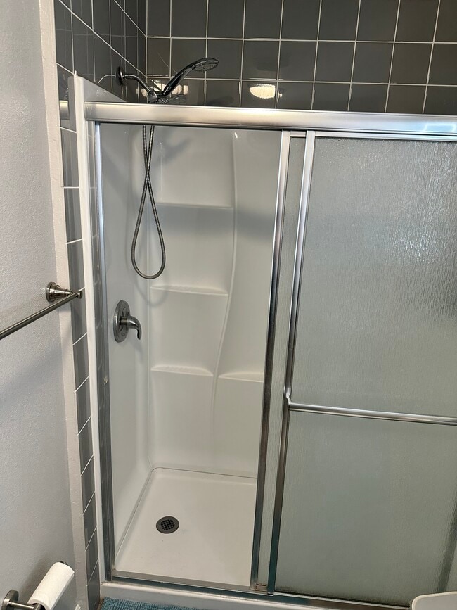 Bathroom shower - 1800 E Heim Ave