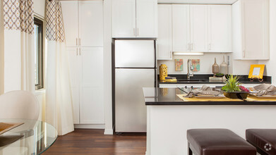 Light and bright kitchens with custom cabinets - Skye at Belltown