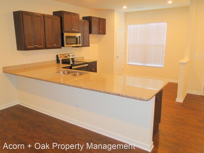 Foto del edificio - 3 br, 2.5 bath House - 8814 Commons Townes...