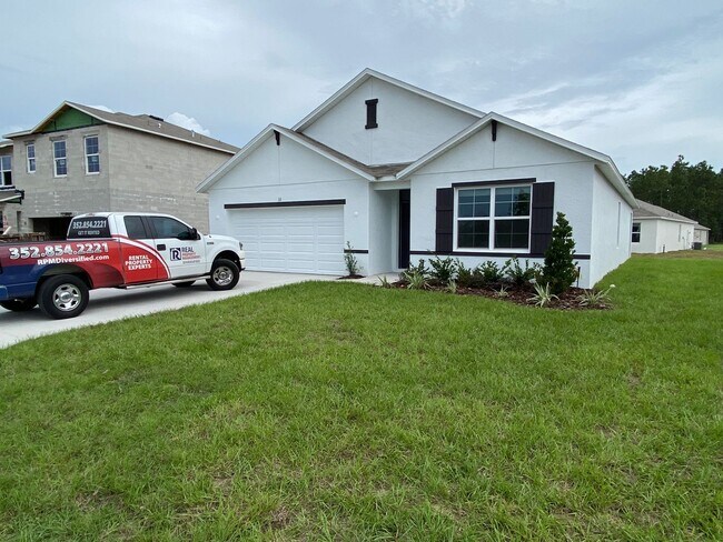 Building Photo - NOT AVAILABLE TO SHOW UNTIL APRIL 3rd. Desirable SE Ocala Neighborhood - Lake Diamond-North - 4/2...