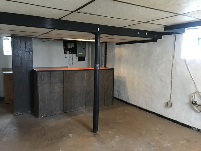 Bar area within basement that can be made into an entertaining area. - 108 Dinsmore Ave