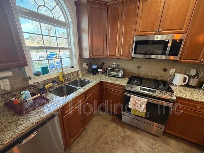 Foto del edificio - 516 Bells Hollow Ct