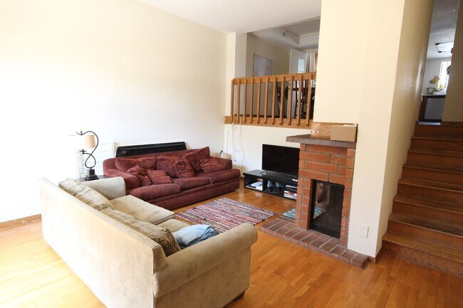 Building Photo - Spacious 3 Bedroom + Bonus Room Townhome with 2-car garage
