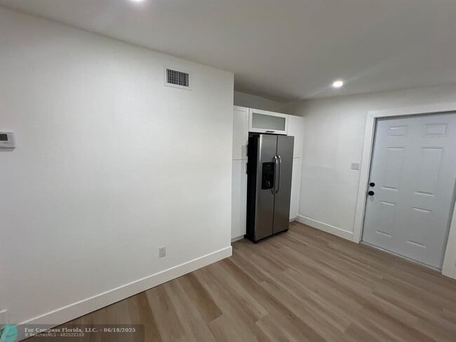 Building Photo - 10540 NW 28th Ave