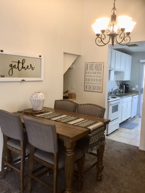 Dining area and entry to kitchen - 4904 Maytime Ln